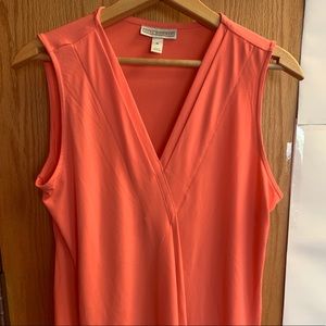 Coral colored v-neck sleeveless blouse NWOT